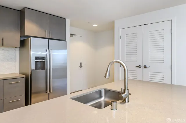 a view of storage and utility room with washer and dryer