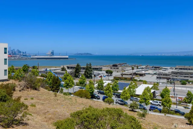 a view of a swimming pool with a lounge chairs