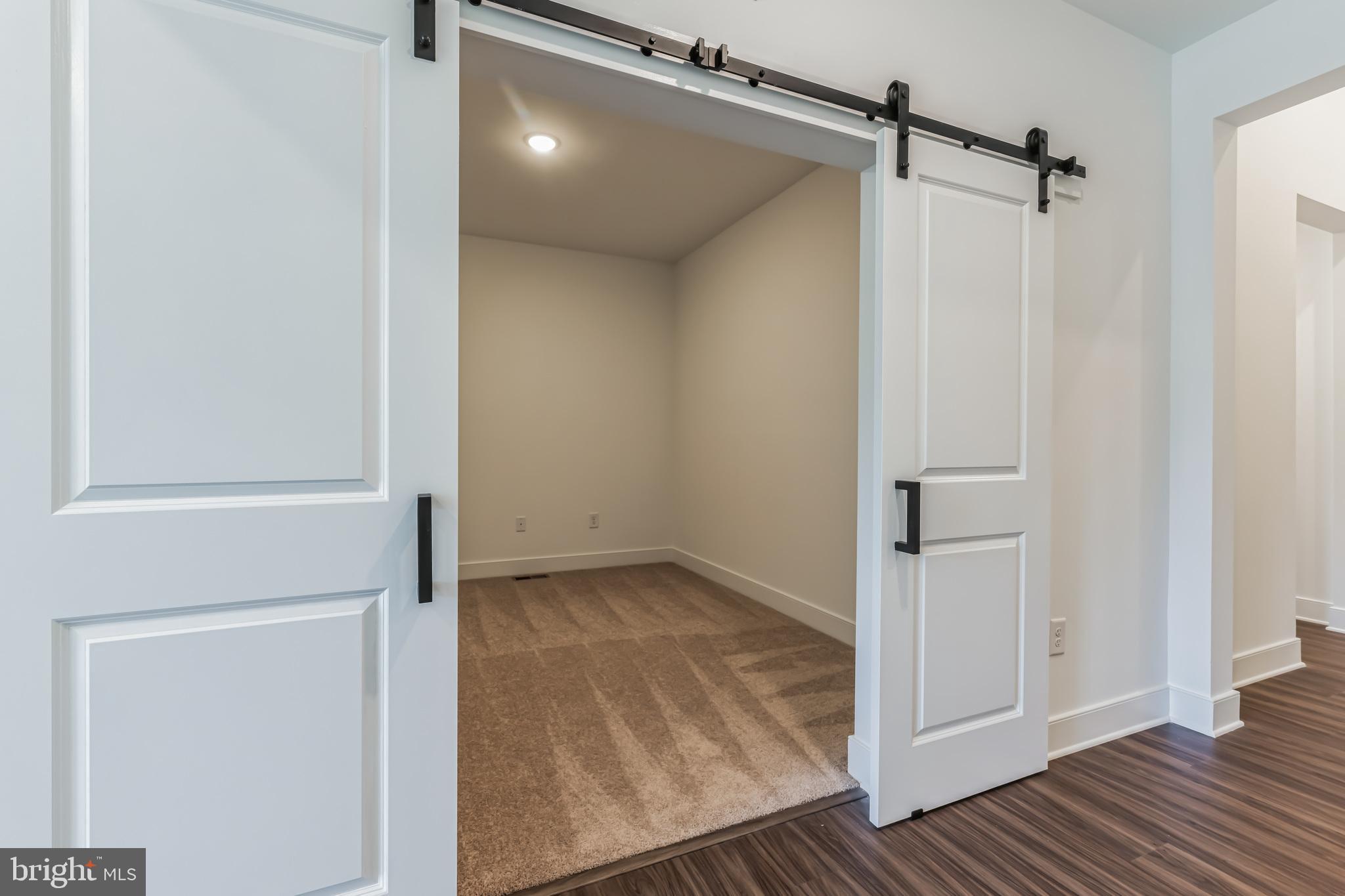 36319 Gate Drive Georgetown, DE 19947 - Photo 4 of 28 a view of a room with wooden floor