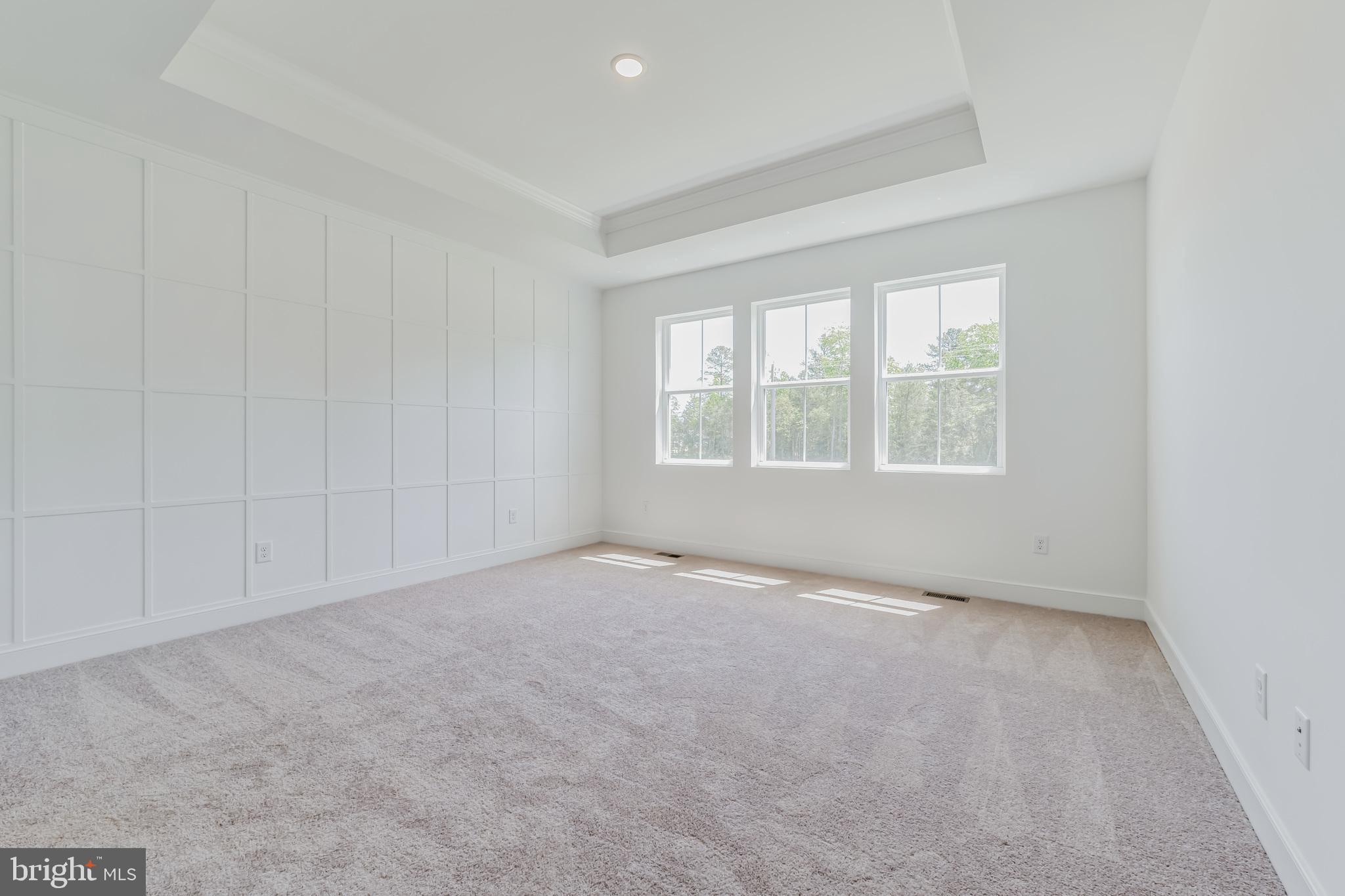 36319 Gate Drive Georgetown, DE 19947 - Photo 5 of 28 an empty room with windows