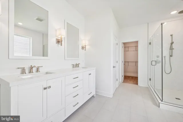 a view of an empty room with a bathroom