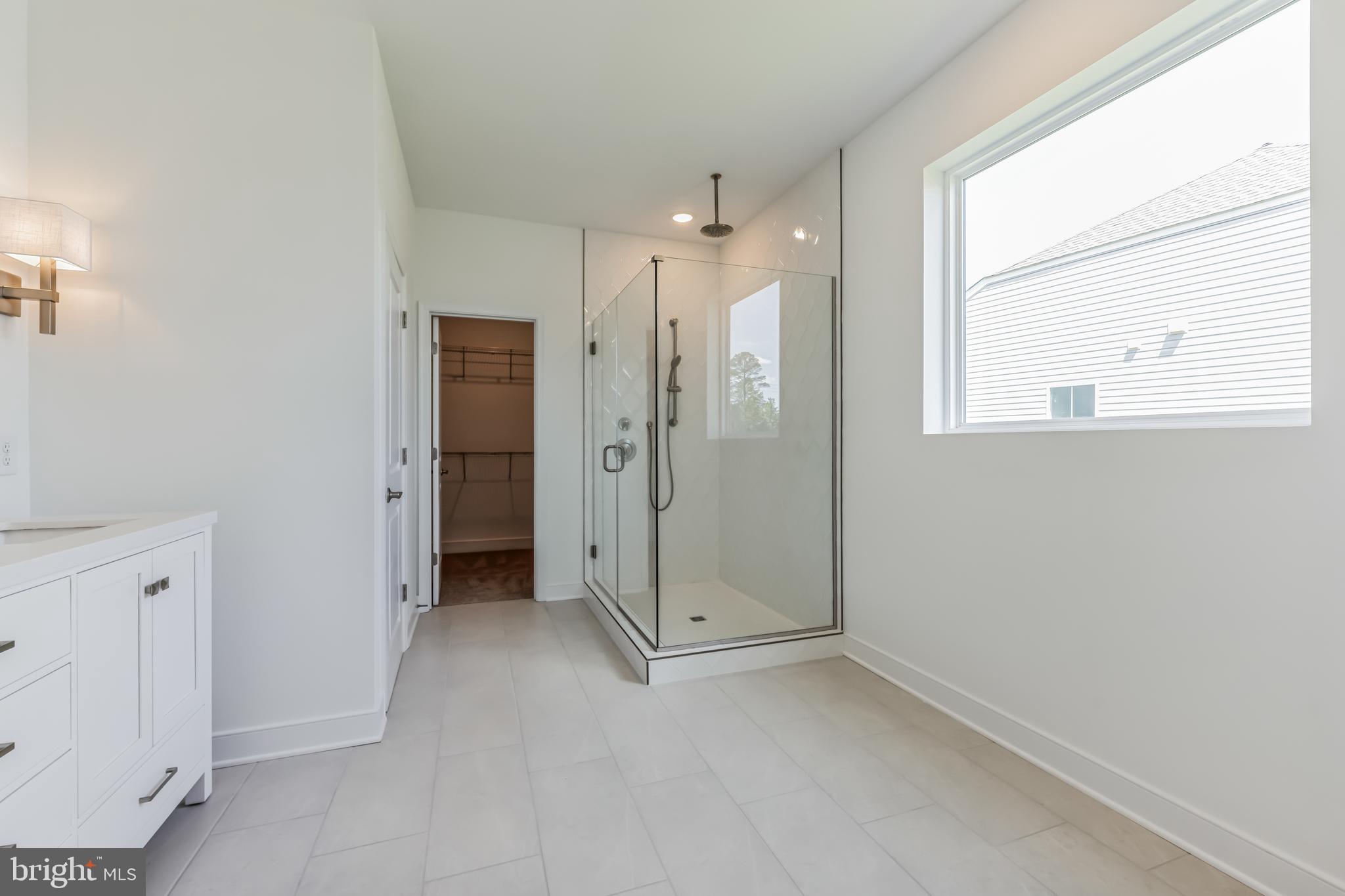 36319 Gate Drive Georgetown, DE 19947 - Photo 8 of 28 a view of an empty room with a bathroom