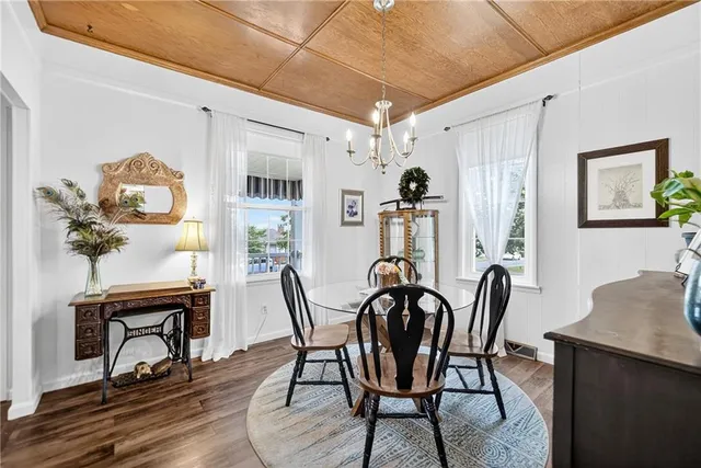 a view of a dining room with furniture