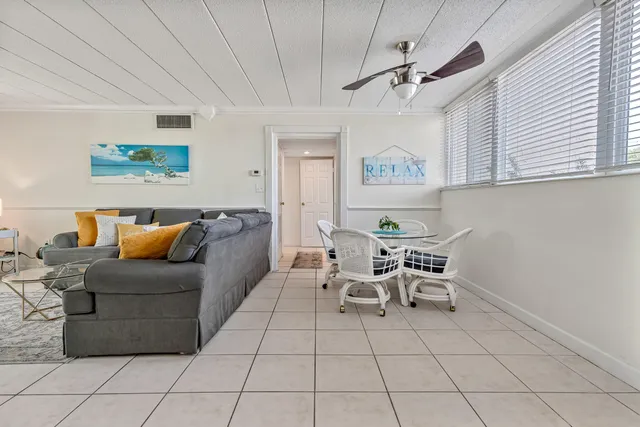 a stove top oven sitting inside of a kitchen