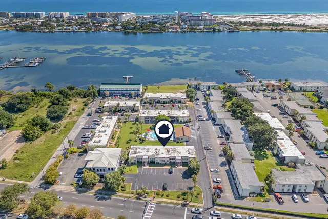 a bedroom with a bed and a chair