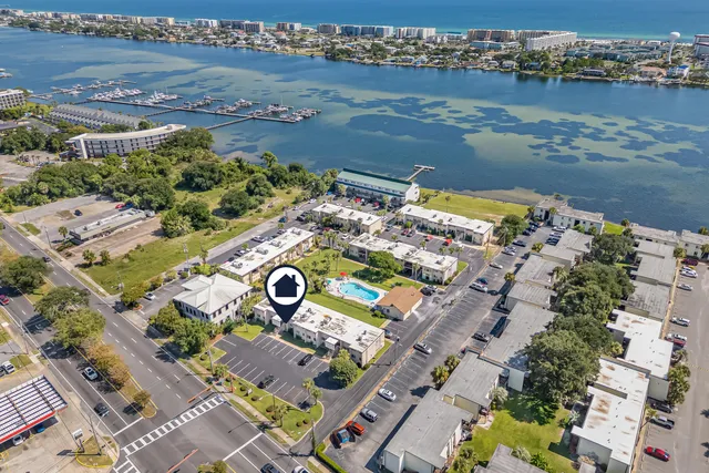 an aerial view of a city with lake view