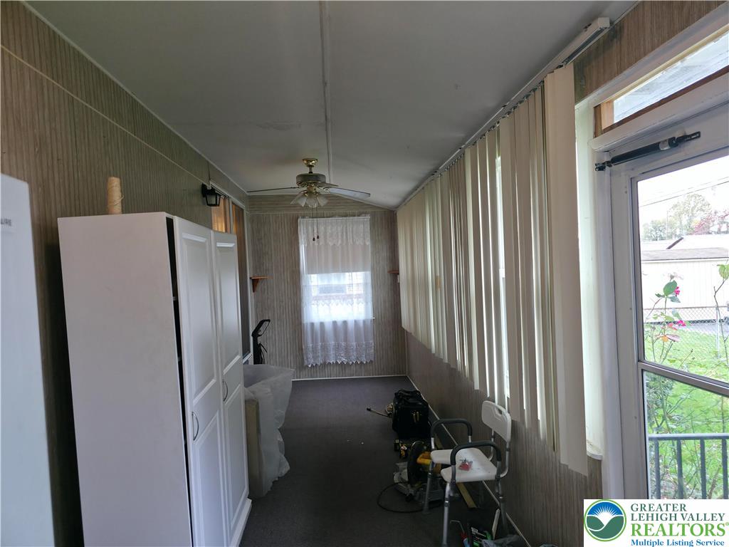 127 East Lynnwood Street Allentown, PA 18103 - Photo 12 of 34 a view of a hallway with furniture and a window