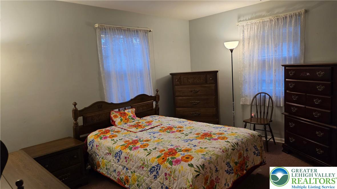 127 East Lynnwood Street Allentown, PA 18103 - Photo 14 of 34 a bedroom with a bed and dresser