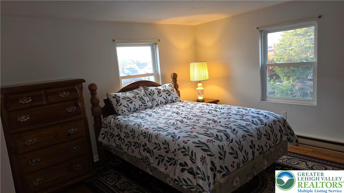 127 East Lynnwood Street Allentown, PA 18103 - Photo 17 of 34 a bedroom with a bed and window