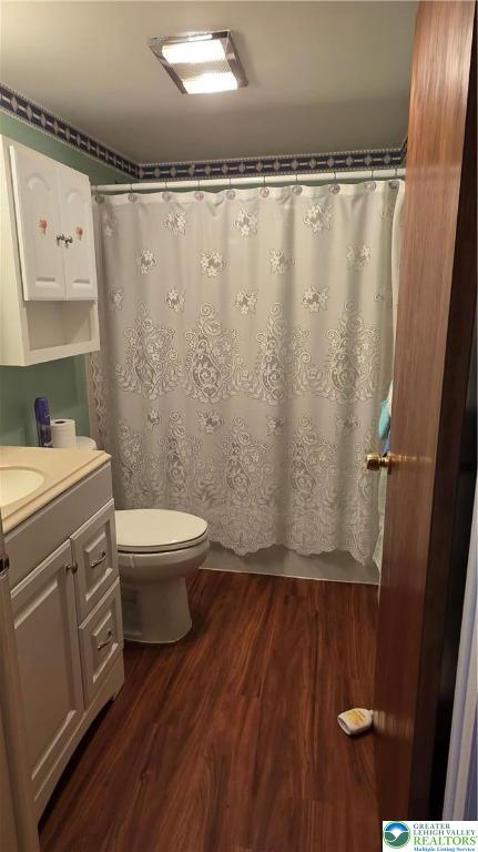 127 East Lynnwood Street Allentown, PA 18103 - Photo 30 of 34 a bathroom with a sink a toilet a mirror and shower