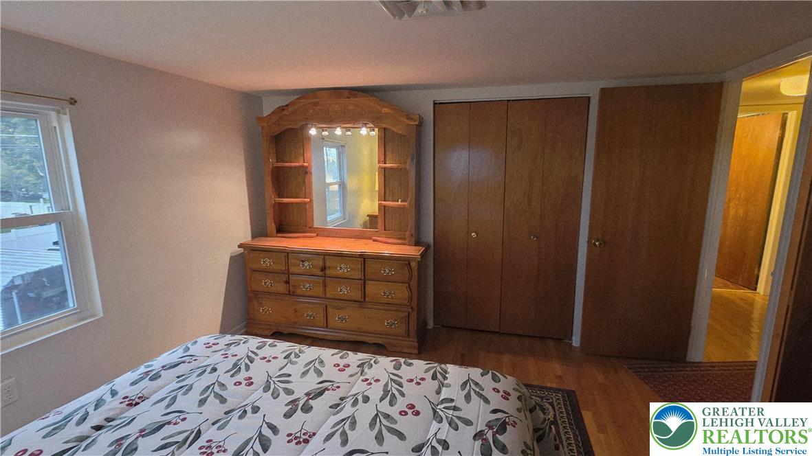 127 East Lynnwood Street Allentown, PA 18103 - Photo 33 of 34 a bedroom with a bed and a mirror