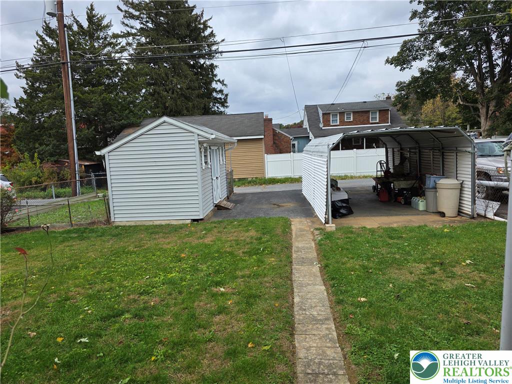 127 East Lynnwood Street Allentown, PA 18103 - Photo 6 of 34 A shed for your lawn mower AND a carport!