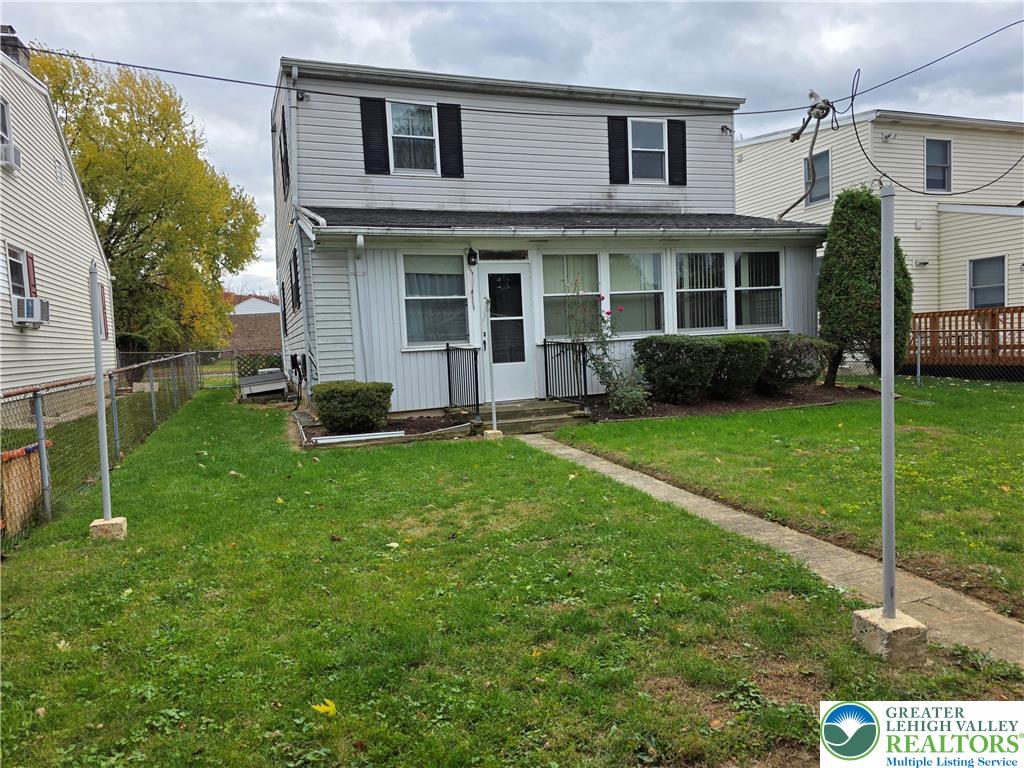 127 East Lynnwood Street Allentown, PA 18103 - Photo 7 of 34 a view of a house with a yard and a large tree