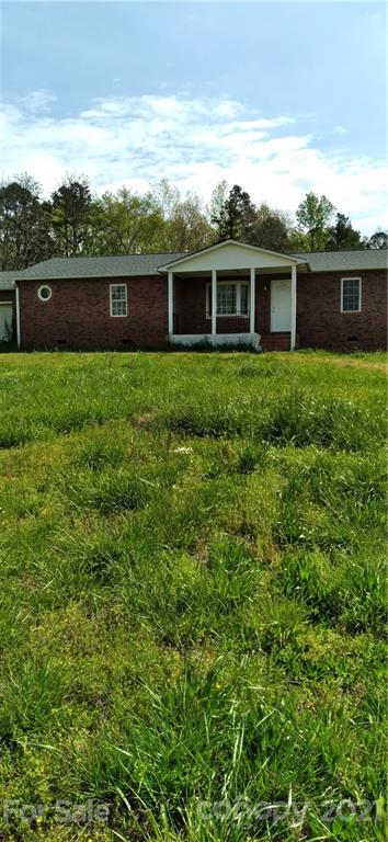 127 Wildcat Road, Unit C Lancaster, SC 29720 - Photo 1 of 15 a front view of house with a yard