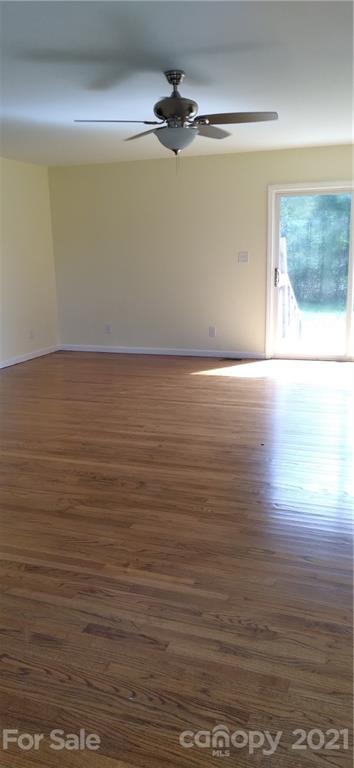 127 Wildcat Road, Unit C Lancaster, SC 29720 - Photo 4 of 15 a view of a room with wooden floor