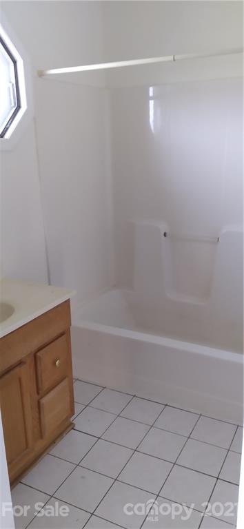 127 Wildcat Road, Unit C Lancaster, SC 29720 - Photo 5 of 15 a bathroom with a bathtub and a shower