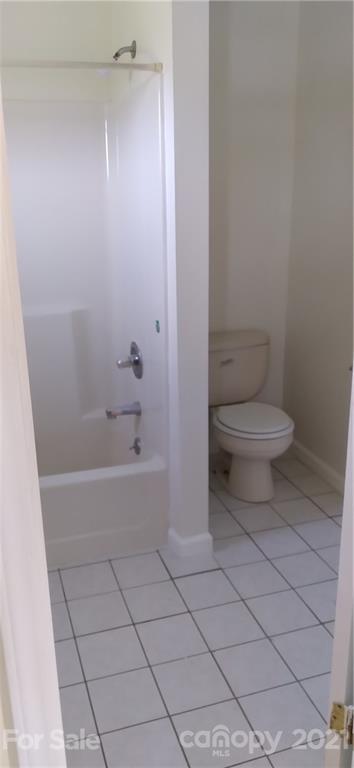 127 Wildcat Road, Unit C Lancaster, SC 29720 - Photo 6 of 15 a bathroom with a toilet and a bathtub