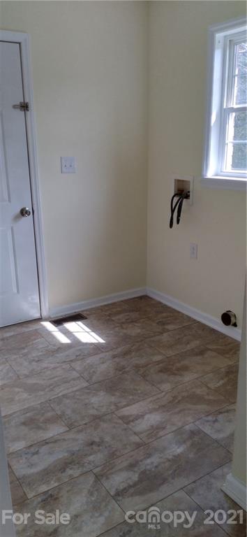 127 Wildcat Road, Unit C Lancaster, SC 29720 - Photo 7 of 15 a view of empty room with window and hardwood floor