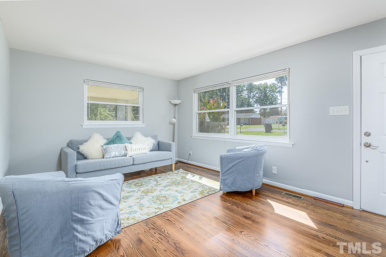 4105 Suitt Road Durham, NC 27703 - Photo 2 of 15 a living room with furniture and a window