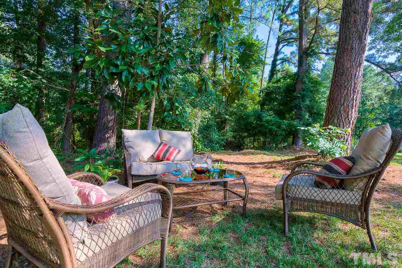 4105 Suitt Road Durham, NC 27703 - Photo 14 of 15 an outdoor sitting area with furniture and garden view