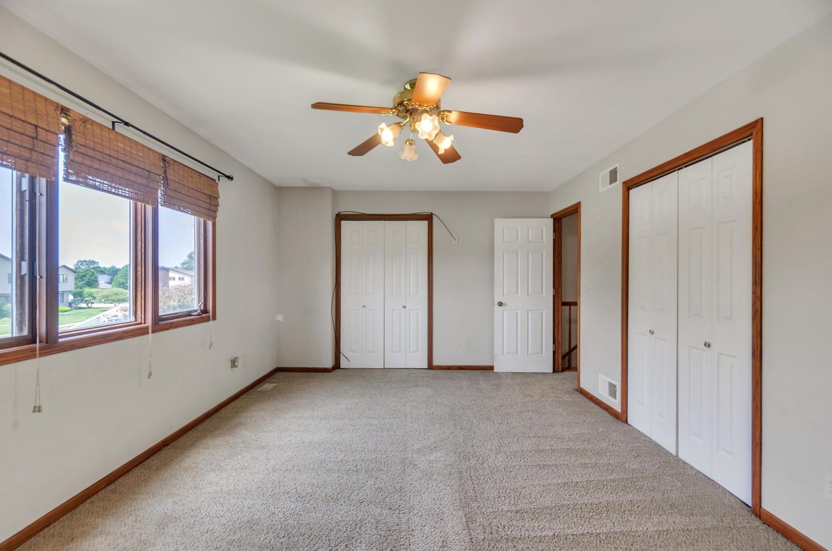 722 Sojourn Road New Lenox, IL 60451 - Photo 16 of 23 a view of an empty room with a window