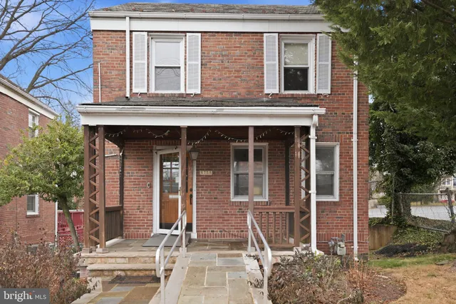 front view of a house with a small yard