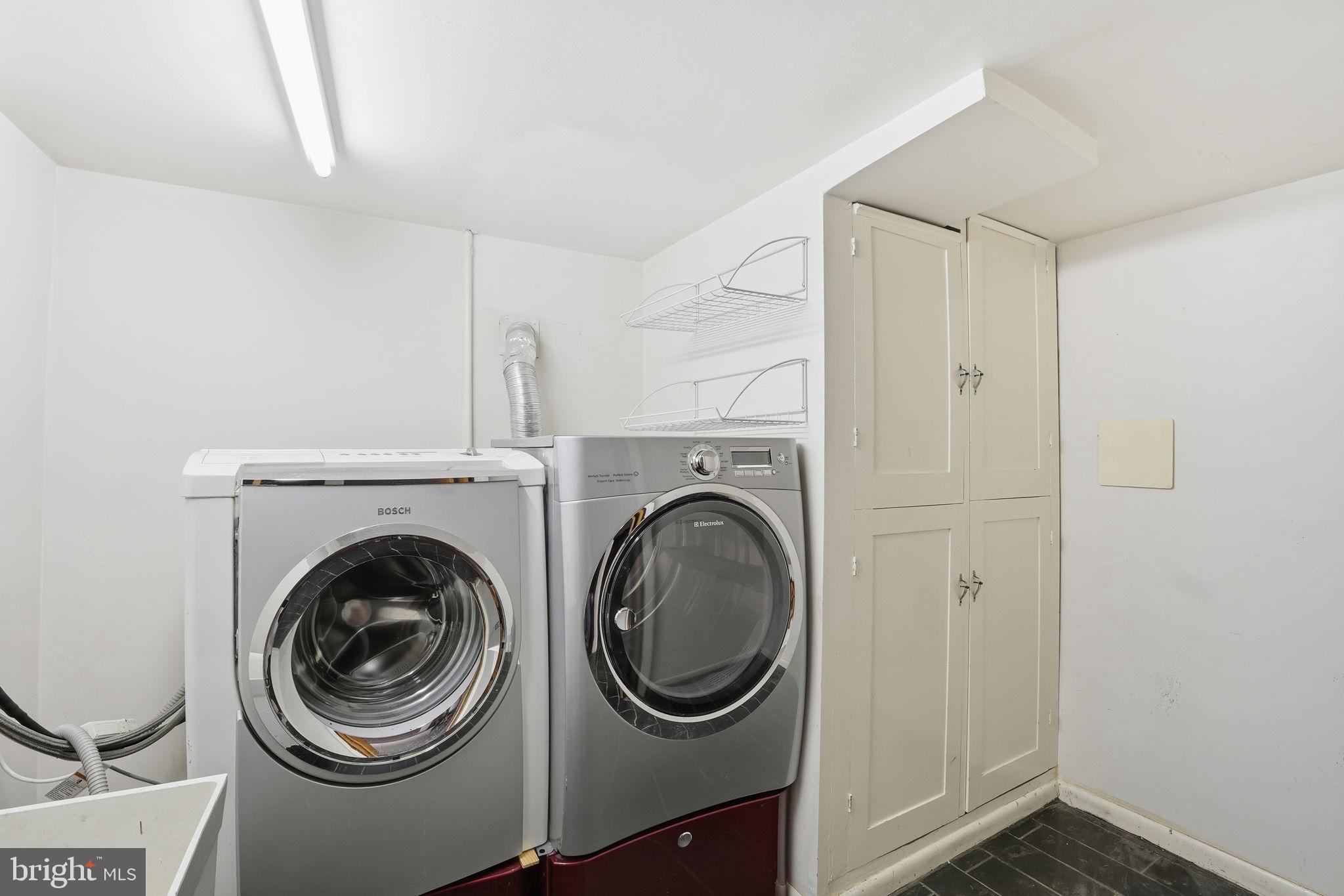 6758 Eastern Avenue Northwest Washington, DC 20012 - Photo 23 of 35 a utility room with sink dryer and washer