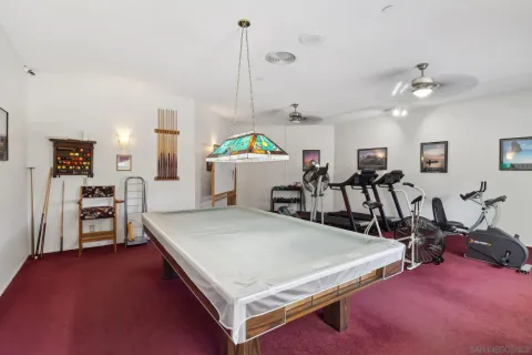 a view of a room with chairs and toys