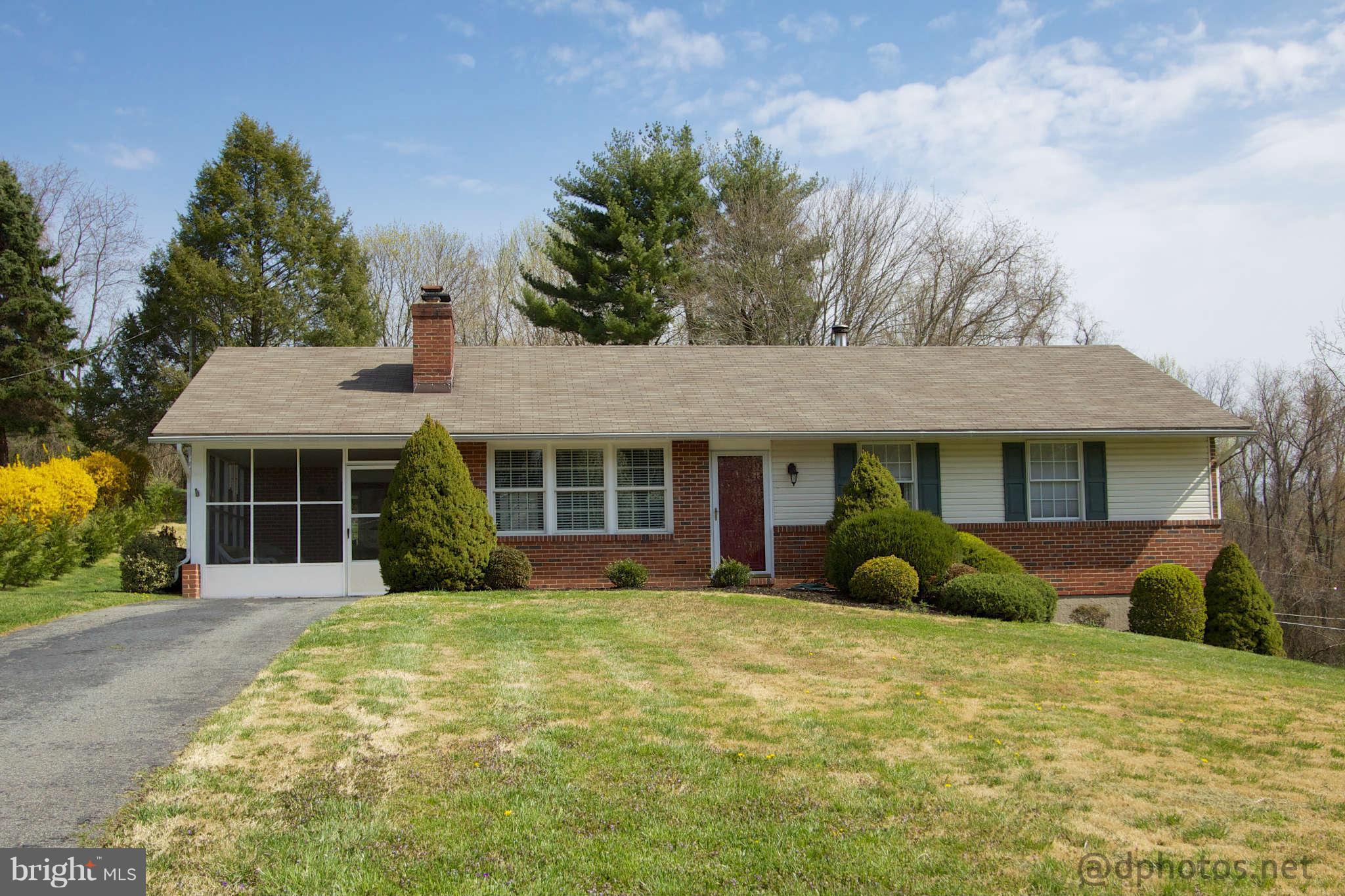 1315 Murgatroyd Road Fallston, MD 21047 - Photo 1 of 30 a front view of a house with garden