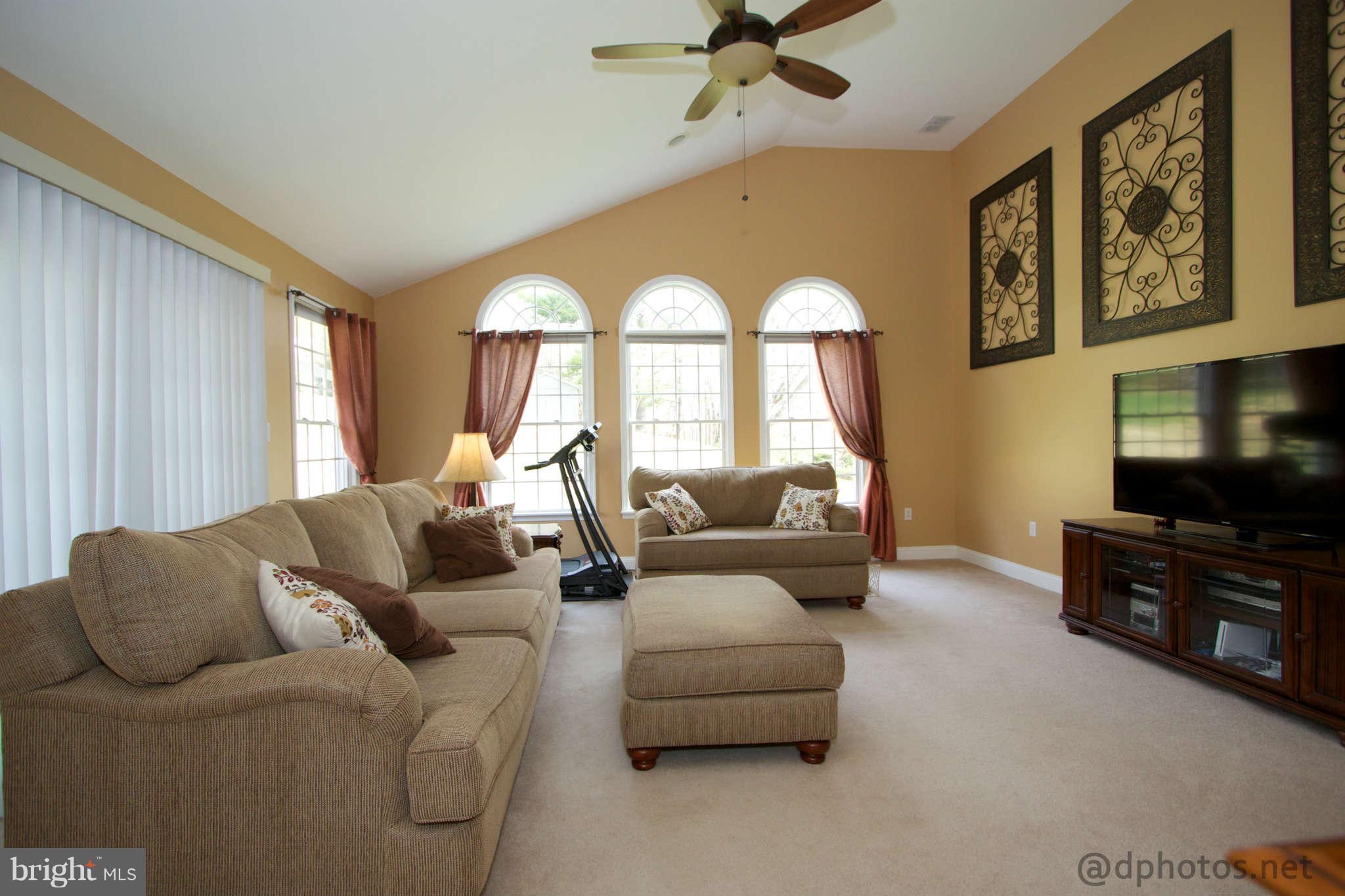 1315 Murgatroyd Road Fallston, MD 21047 - Photo 14 of 30 a living room with furniture and a flat screen tv