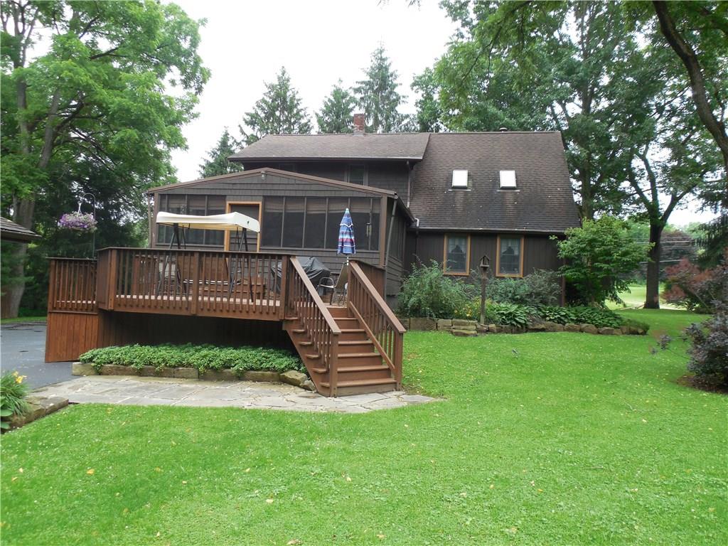 541 Pulaski Road Pulaski, PA 16143 - Photo 2 of 24 From the back you can enjoy the open deck and the screened in porch.