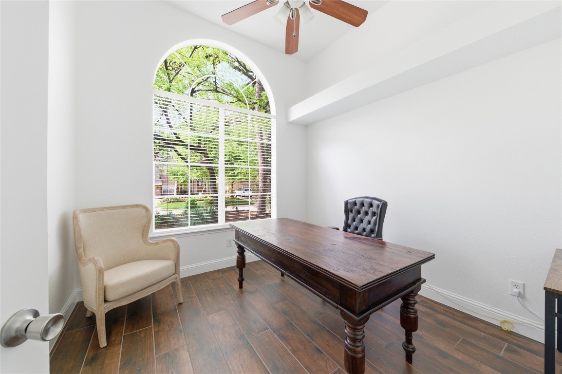 50 East Greywing Circle Spring, TX 77382 - Photo 11 of 37 Home office with a large arched window, offering plenty of natural light.