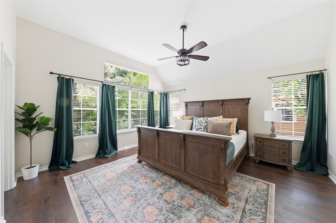 50 East Greywing Circle Spring, TX 77382 - Photo 21 of 37 This bedroom features a high ceiling and abundant natural light from large windows.