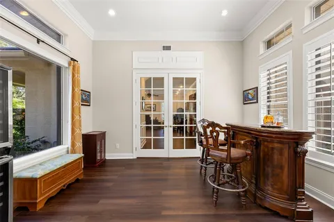 a bathroom with a sink a vanity and a mirror