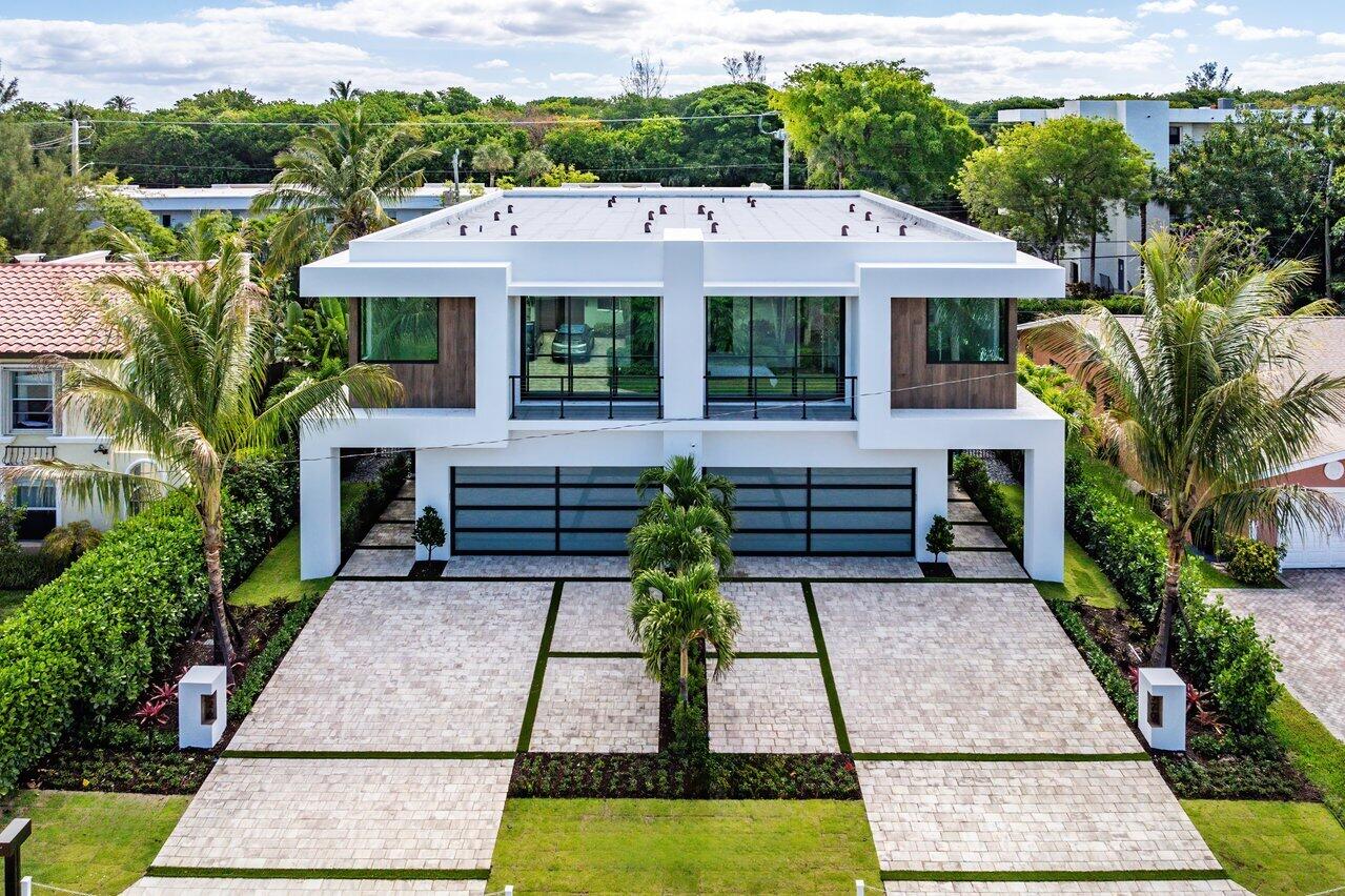 320 Northeast Wavecrest Way Boca Raton, FL 33432 - Photo 2 of 48 a aerial view of a house with garden