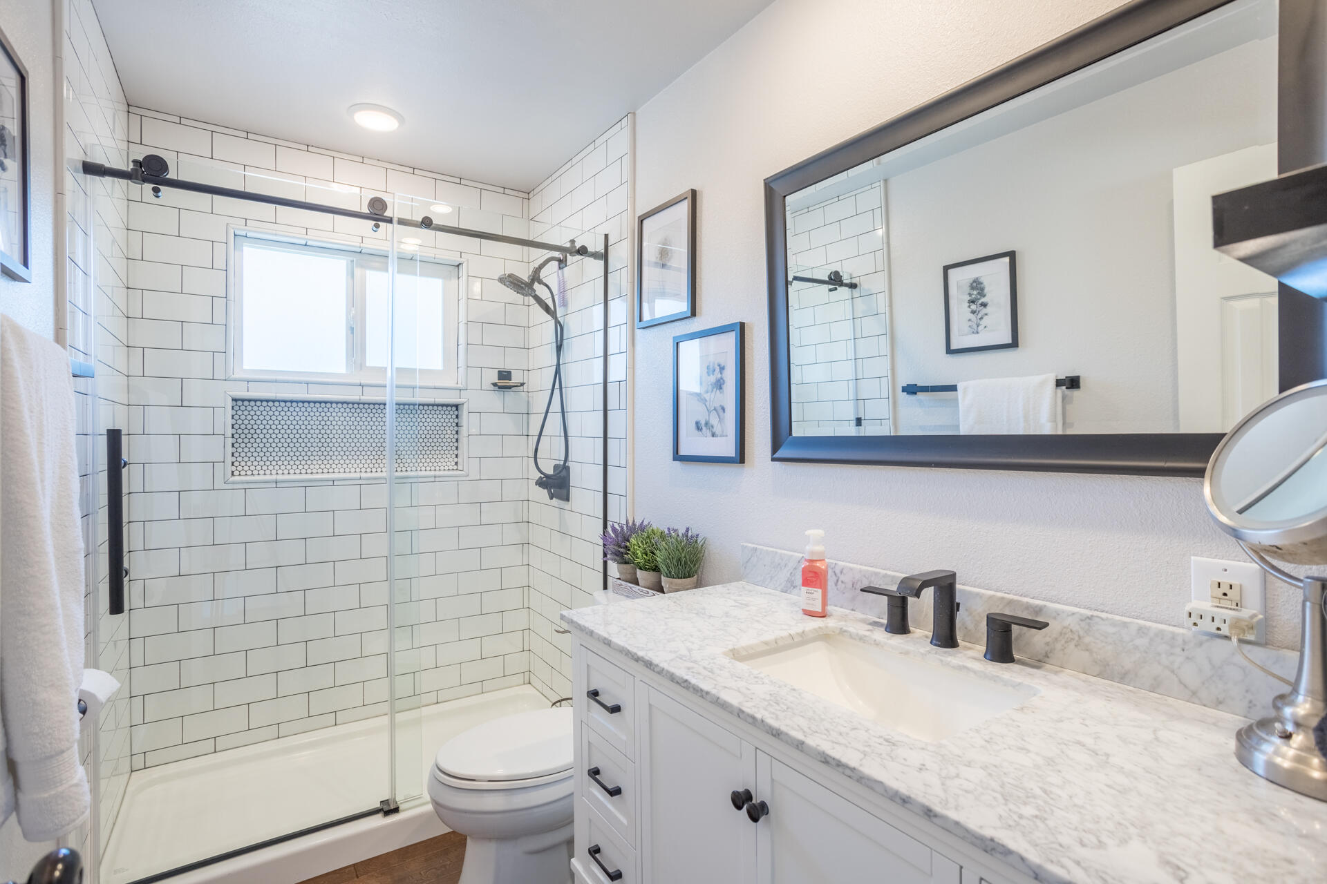 2766 Robert Court Redding, CA 96002 - Photo 14 of 28 a bathroom with a granite countertop sink a toilet and shower