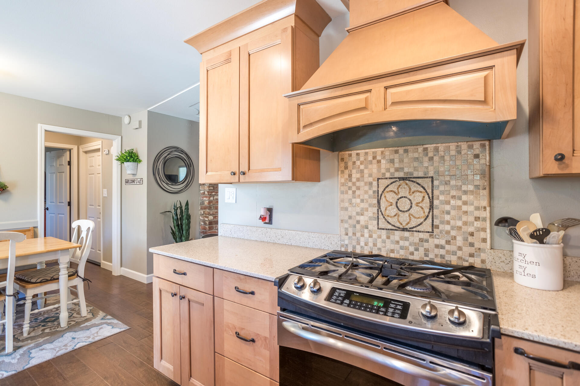 2766 Robert Court Redding, CA 96002 - Photo 7 of 28 a kitchen with a stove and a refrigerator