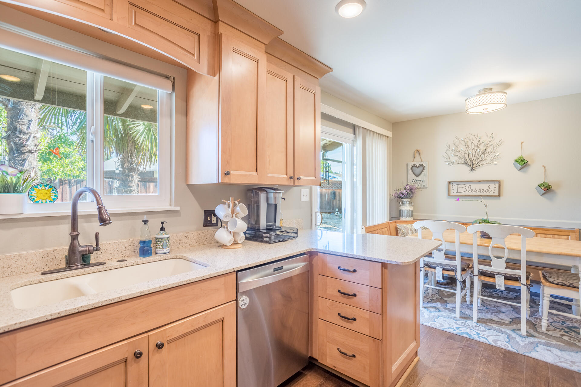 2766 Robert Court Redding, CA 96002 - Photo 8 of 28 a kitchen with cabinets appliances and a window