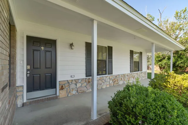 front view of the house with an outdoor space