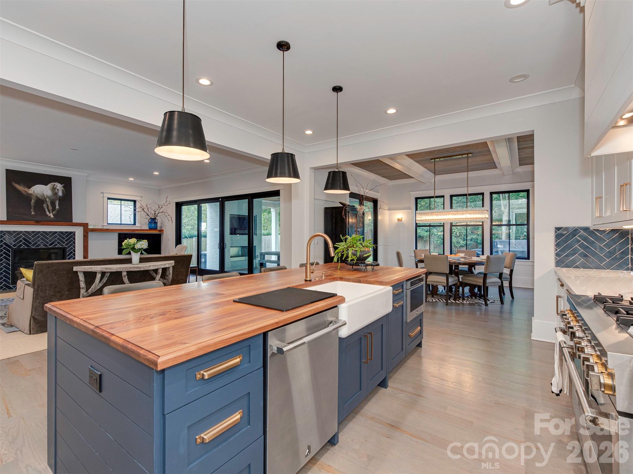 4009 Ridgecrest Avenue Charlotte, NC 28211 - Photo 15 of 43 a kitchen with a table and chairs in it