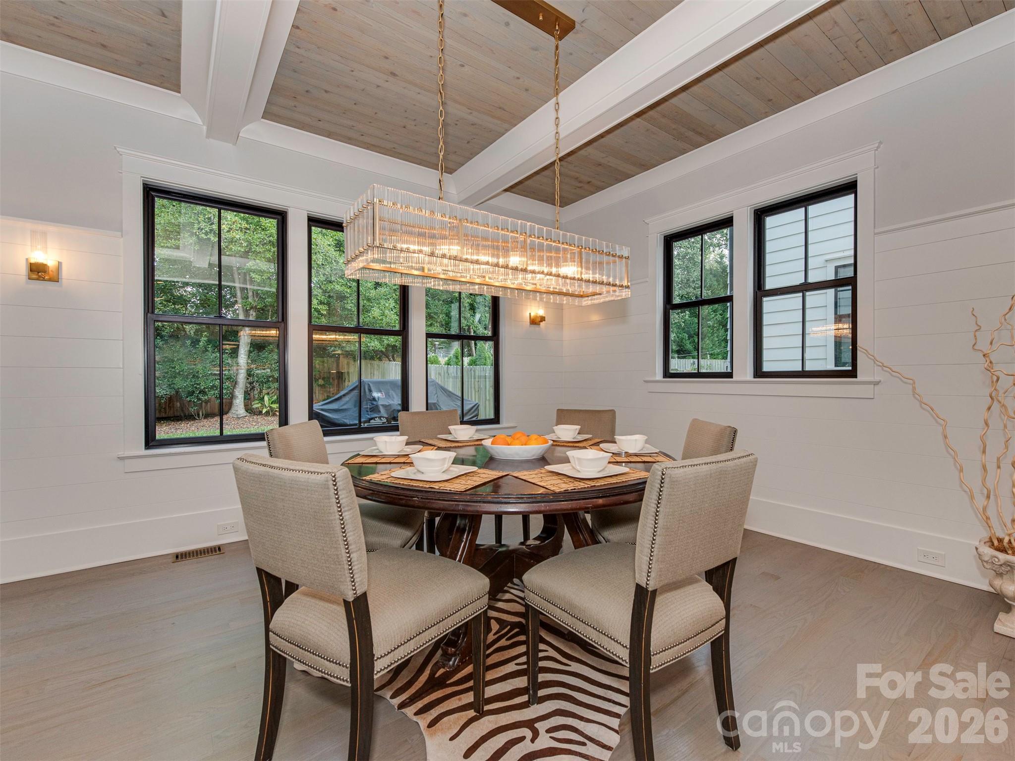 4009 Ridgecrest Avenue Charlotte, NC 28211 - Photo 16 of 43 a view of a dining room with furniture window and outside view