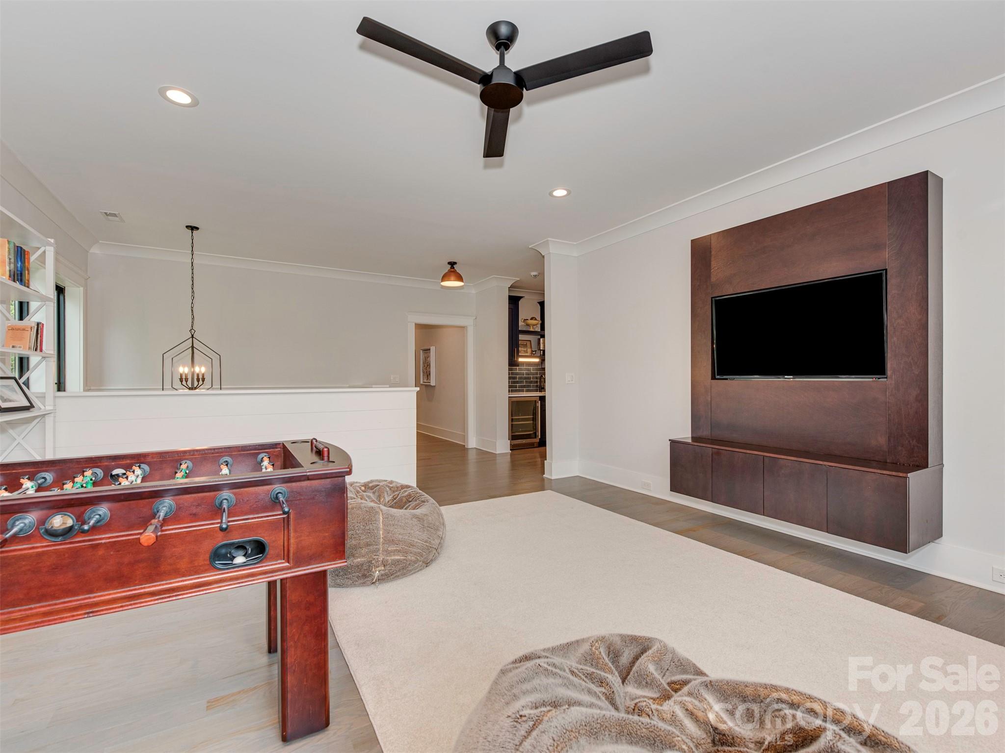 4009 Ridgecrest Avenue Charlotte, NC 28211 - Photo 24 of 43 a bedroom with a bed and a television