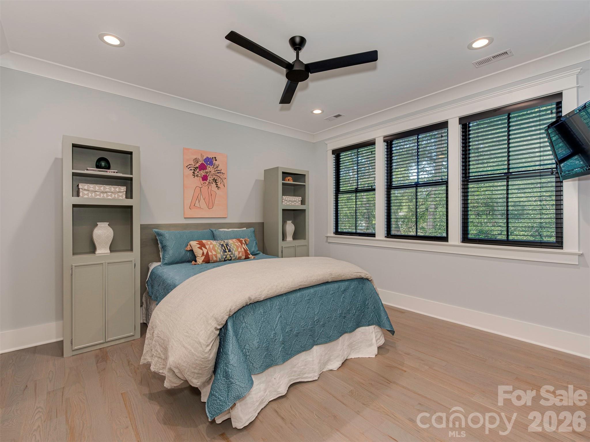 4009 Ridgecrest Avenue Charlotte, NC 28211 - Photo 26 of 43 a bed room with a bed and a large window