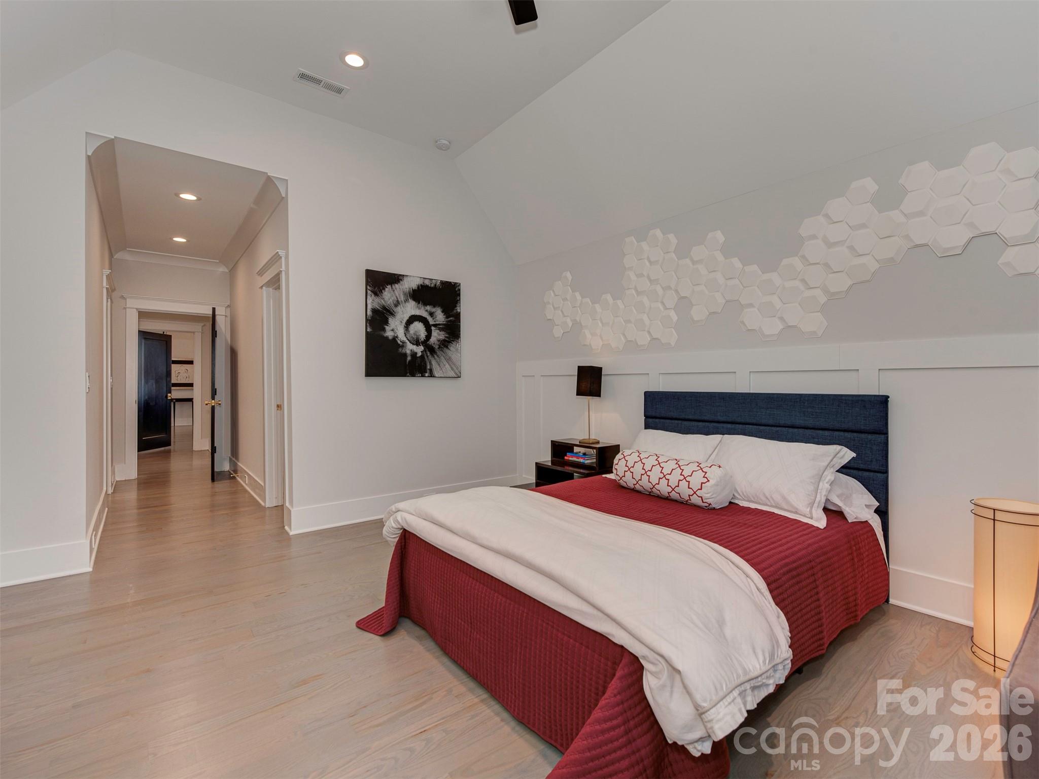 4009 Ridgecrest Avenue Charlotte, NC 28211 - Photo 30 of 43 a bedroom with bed and a night stand