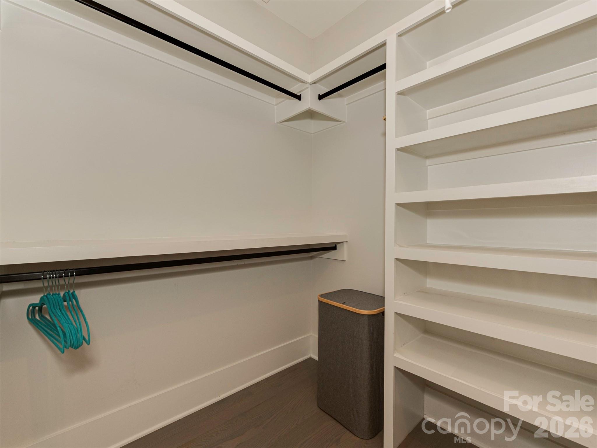 4009 Ridgecrest Avenue Charlotte, NC 28211 - Photo 33 of 43 a view of walk in closet with empty racks