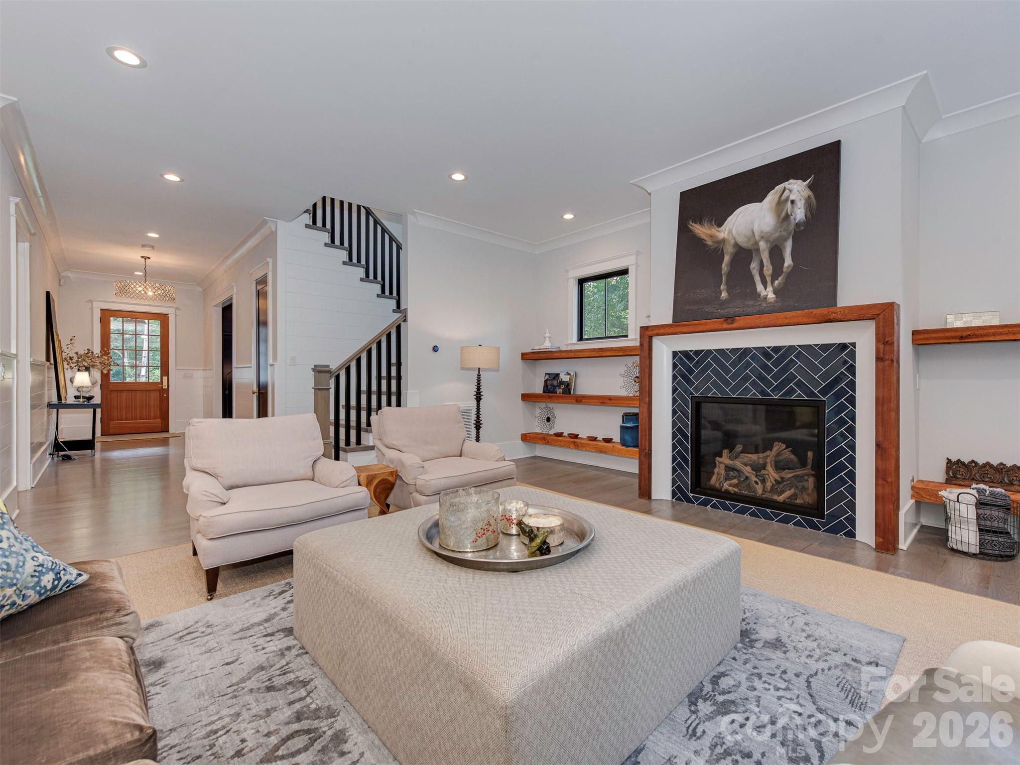 4009 Ridgecrest Avenue Charlotte, NC 28211 - Photo 7 of 43 a living room with furniture and a fireplace