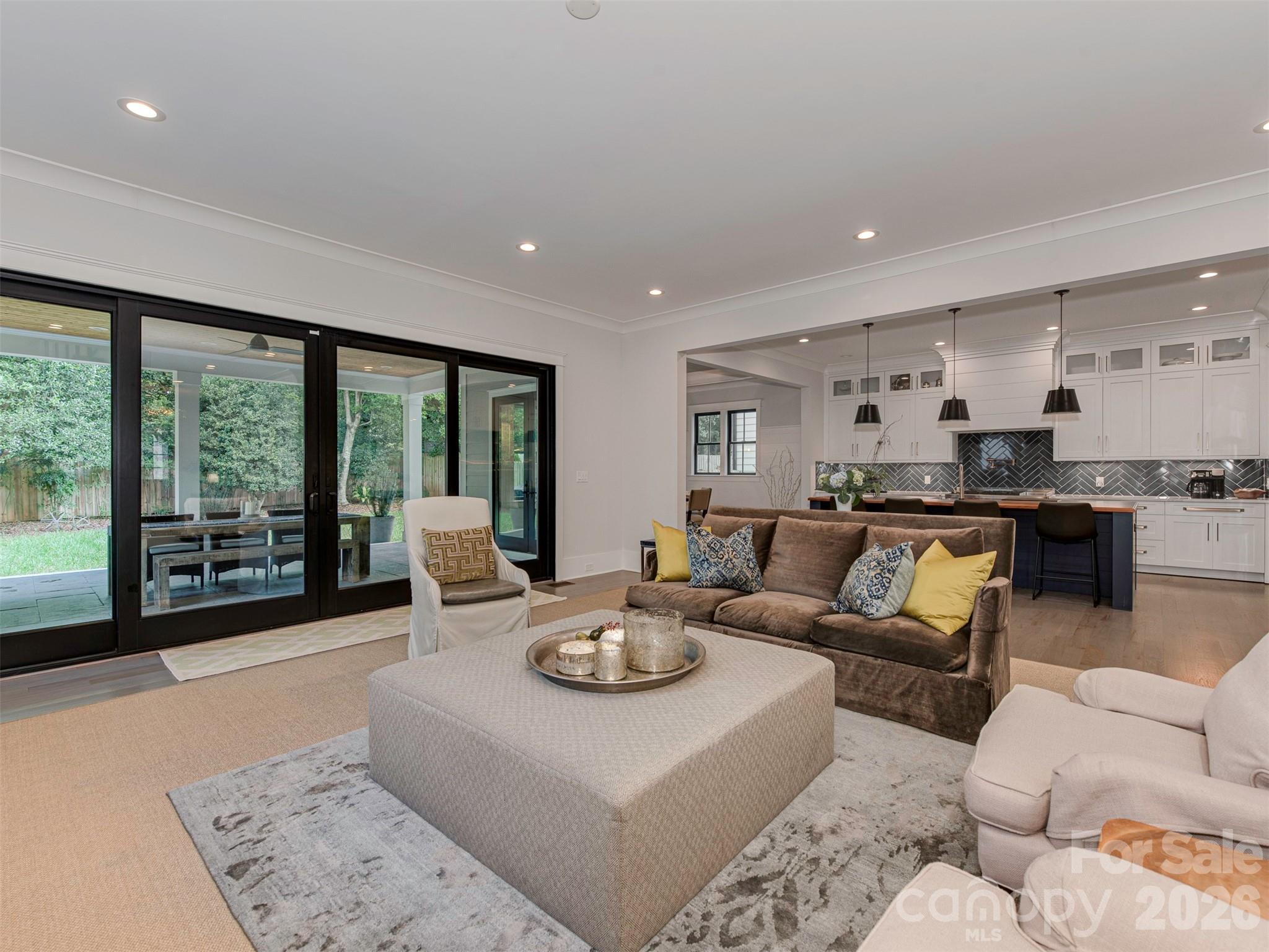 4009 Ridgecrest Avenue Charlotte, NC 28211 - Photo 8 of 43 a living room with furniture and a large window