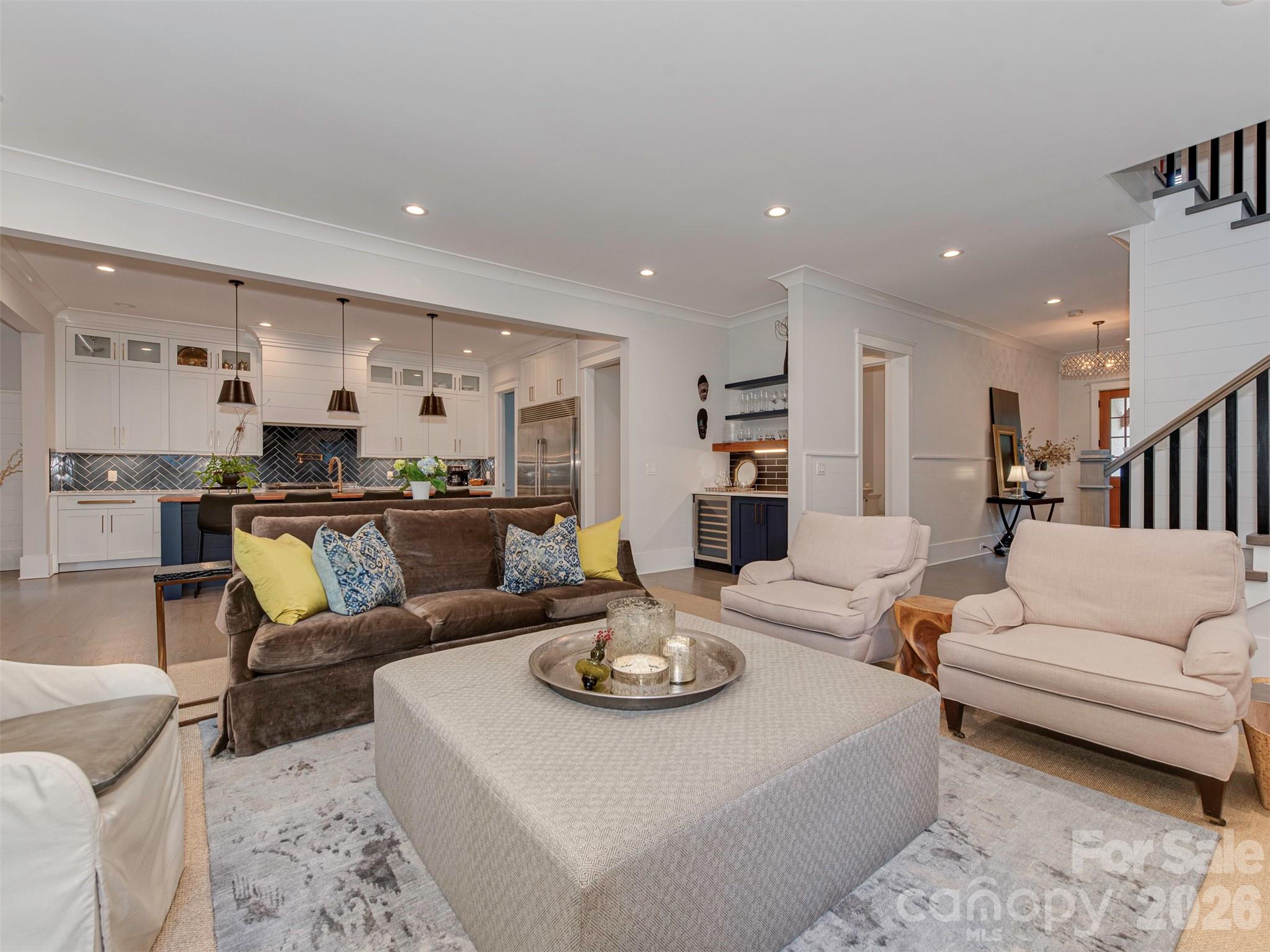 4009 Ridgecrest Avenue Charlotte, NC 28211 - Photo 10 of 43 a living room with furniture kitchen view and a table