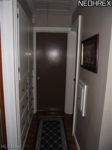 22666 Georgetown Road Homeworth, OH 44634 - Photo 9 of 20 Hallway which has the WHOLE HOUSE fan system and nice buildins for storage.