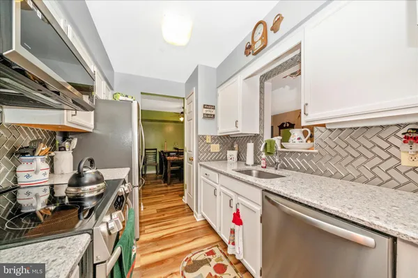 a kitchen with granite countertop lots of counter top space